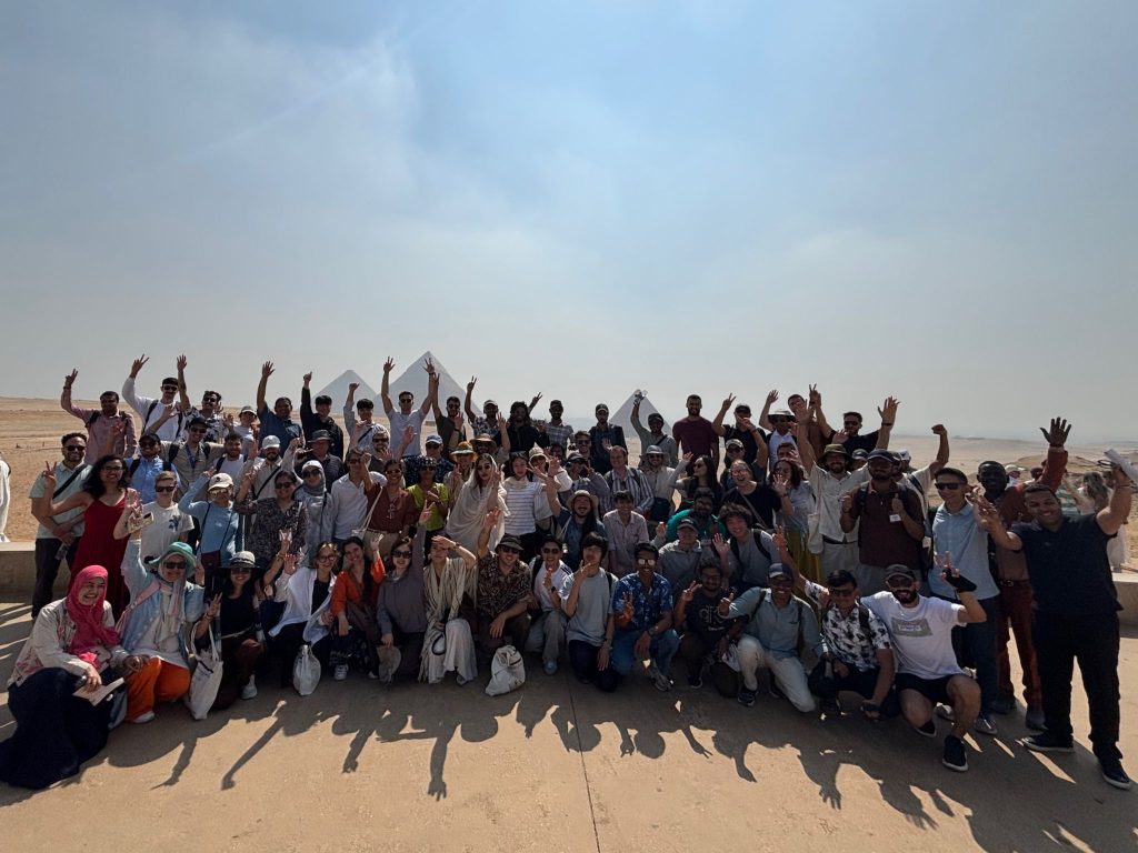Group photo in front of the pyramids in Cairo, Egypt